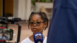 Enfant interviewé par BFM Nice lors d'un événement sur le pilier social du Meeting Nikaia